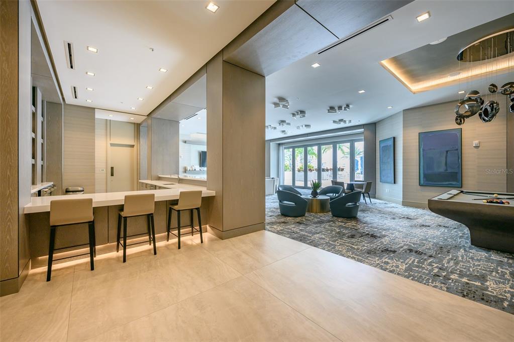 111 South Pineapple Avenue, Unit 1013 Sarasota, FL 34236 - Photo 48 of 62 a very nice looking room with a large window and sitting space