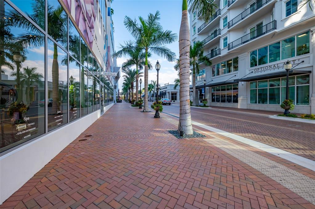 111 South Pineapple Avenue, Unit 1013 Sarasota, FL 34236 - Photo 53 of 62 a view of a building with a yard