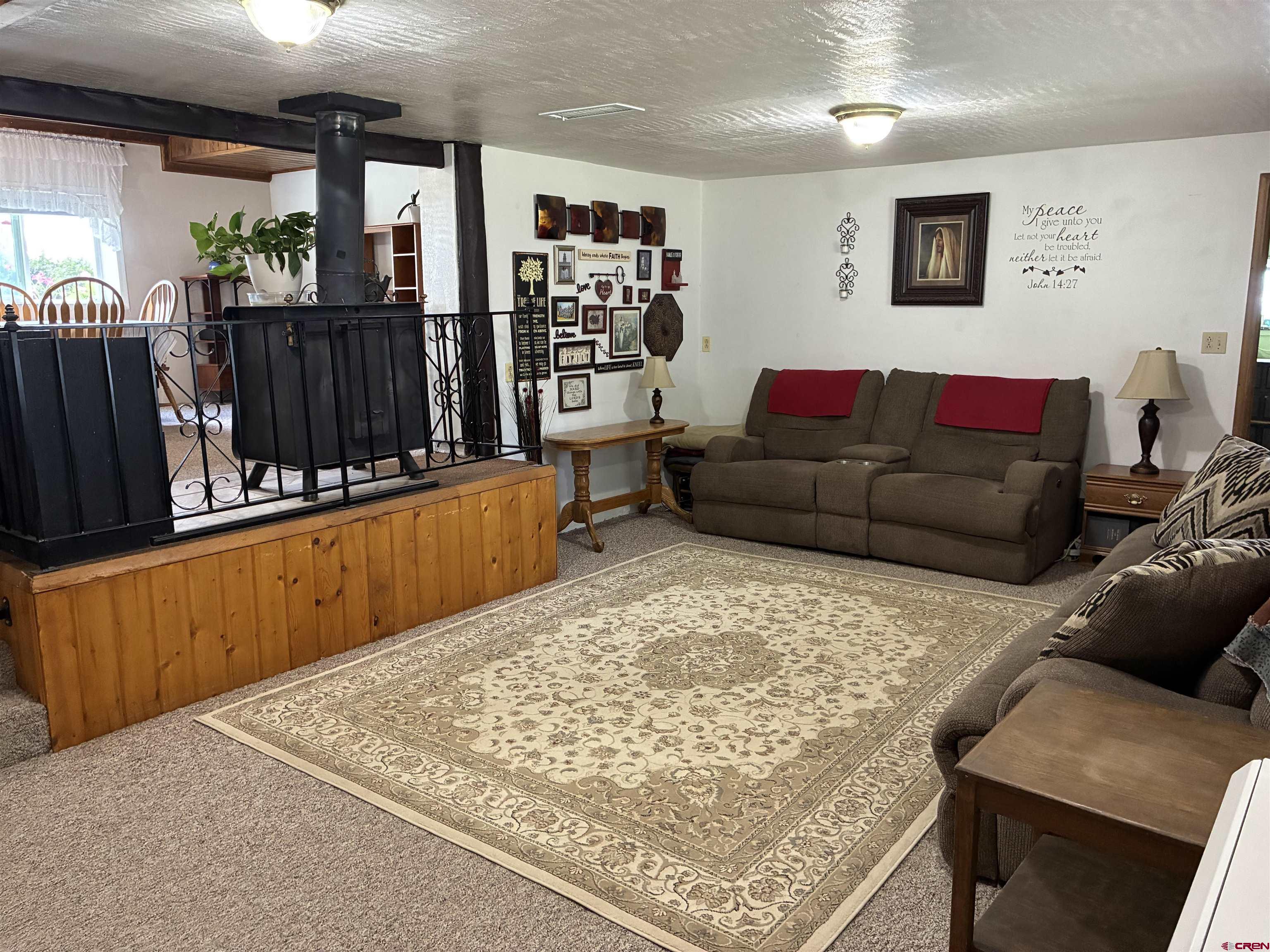 20806 County Road West Sanford, CO 81151 - Photo 12 of 24 a living room with furniture