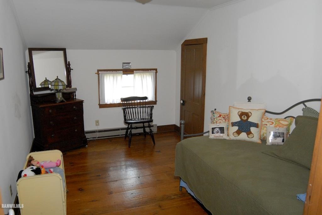 18939 Timberlake Road Mount Carroll, IL 61053 - Photo 23 of 25 a bedroom with furniture and a window