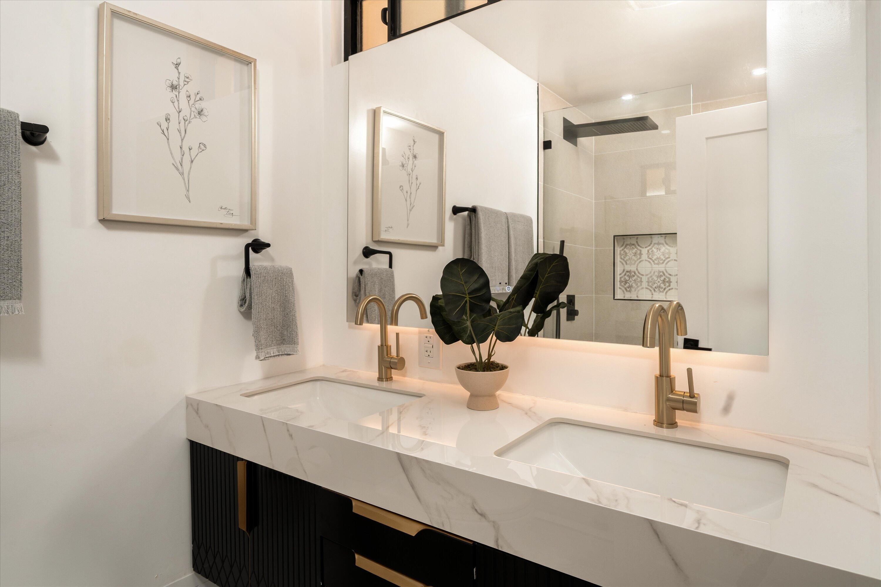 674 Burtis Street Santa Barbara, CA 93111 - Photo 12 of 29 a bathroom with a sink and a mirror