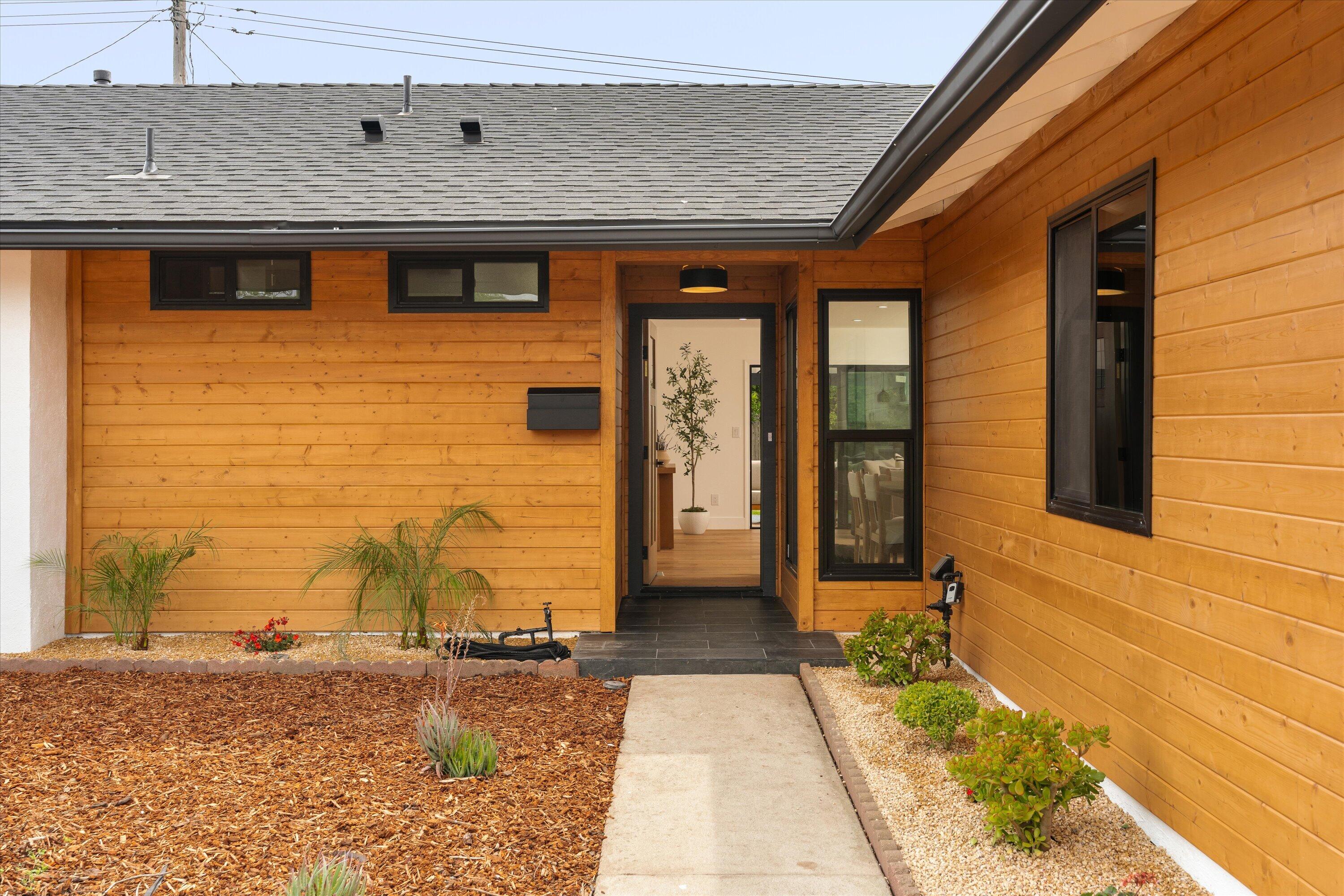 674 Burtis Street Santa Barbara, CA 93111 - Photo 3 of 29 a front view of a house with a yard