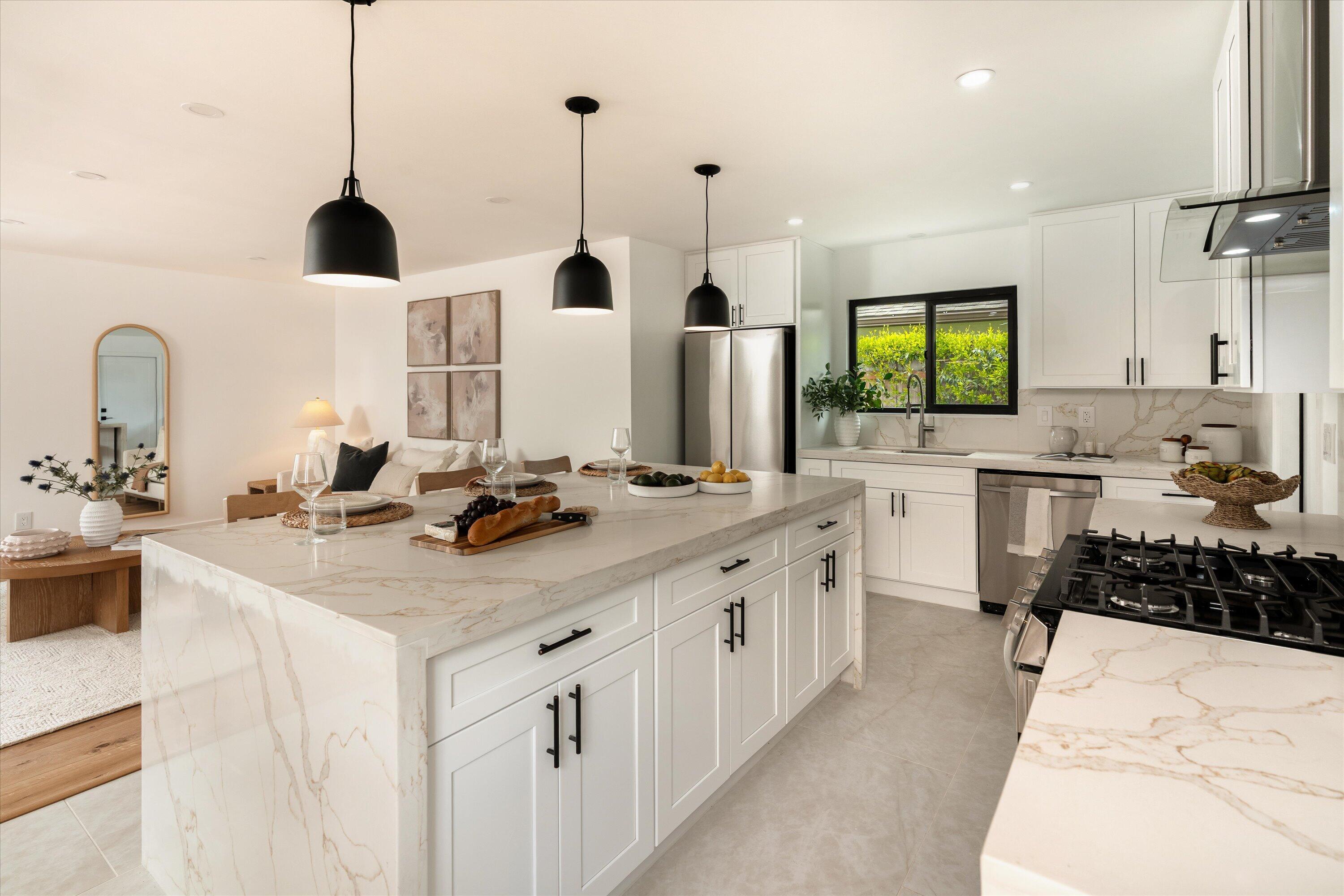 674 Burtis Street Santa Barbara, CA 93111 - Photo 8 of 29 a kitchen with a sink stove and cabinets