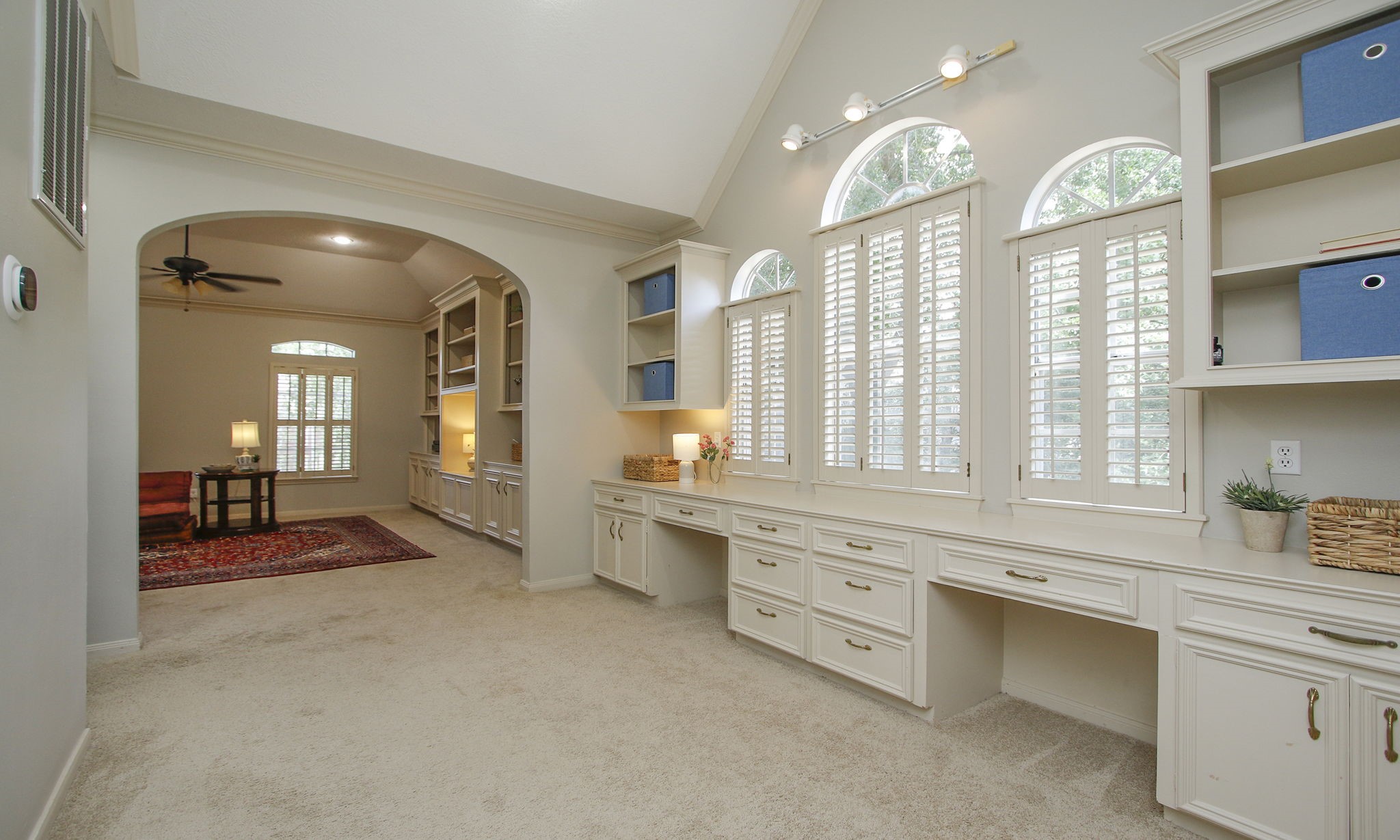 15923 Harwick Drive Spring, TX 77379 - Photo 34 of 50 This incredible study located adjacent to the game room is anything but ordinary! A soaring ceiling and wall of plantation-shuttered windows create an inviting space, while extensive built-ins offer plenty of room for homework, crafts, working from home, or managing a busy household.