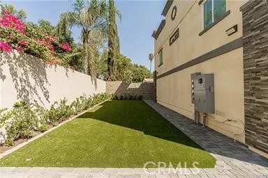 a view of a back yard of the house