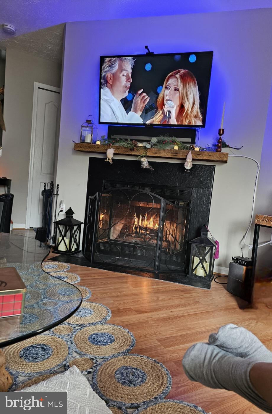 4657 Deepwood Court, Unit 106A Bowie, MD 20720 - Photo 11 of 29 a living room with furniture and a fireplace