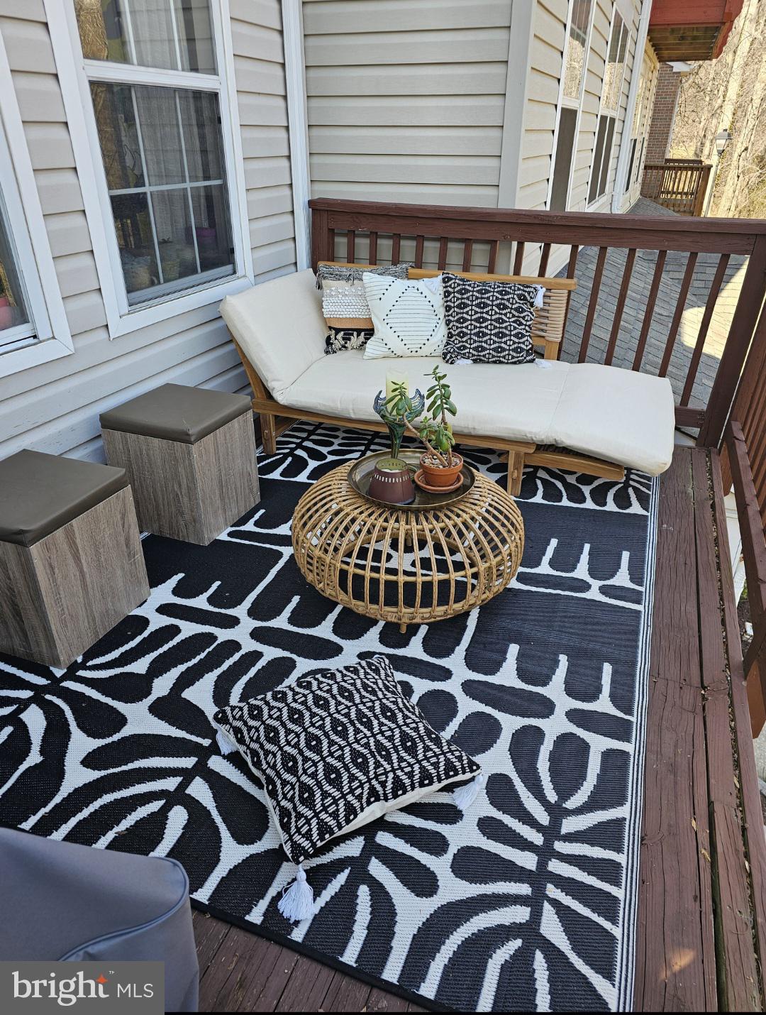4657 Deepwood Court, Unit 106A Bowie, MD 20720 - Photo 16 of 29 a view of balcony with wooden floor