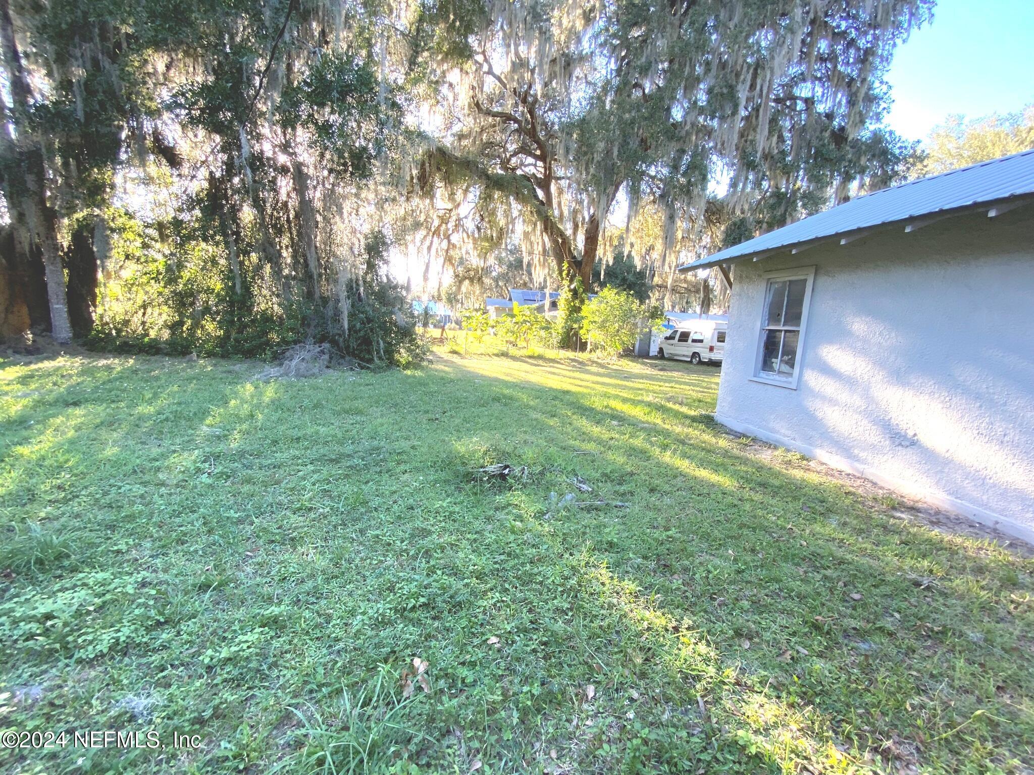 312 Oak Street Crescent City, FL 32112 - Photo 22 of 25 back yard/garage
