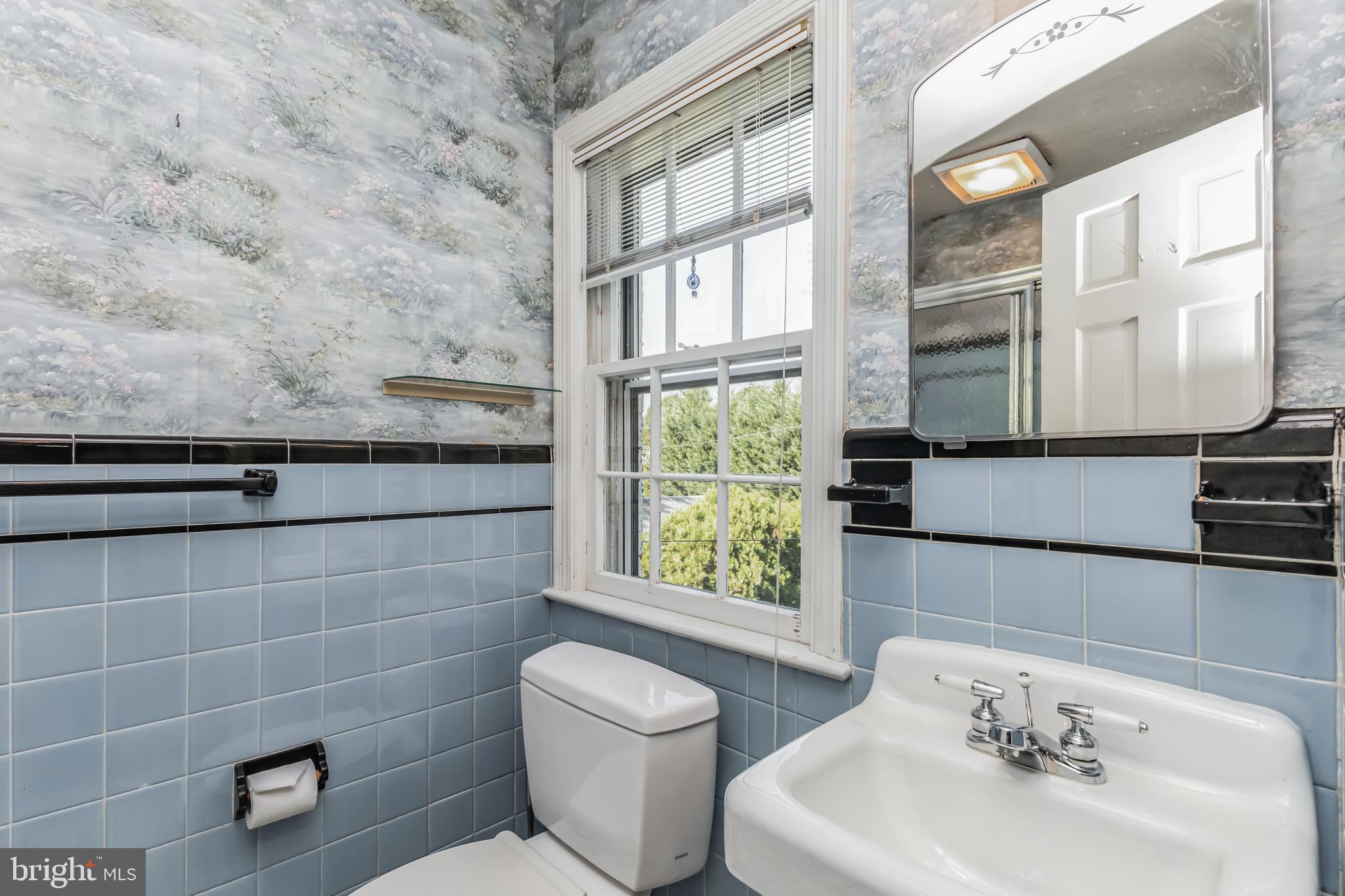 9410 Colesville Road Silver Spring, MD 20901 - Photo 22 of 38 Second full bathroom upper level