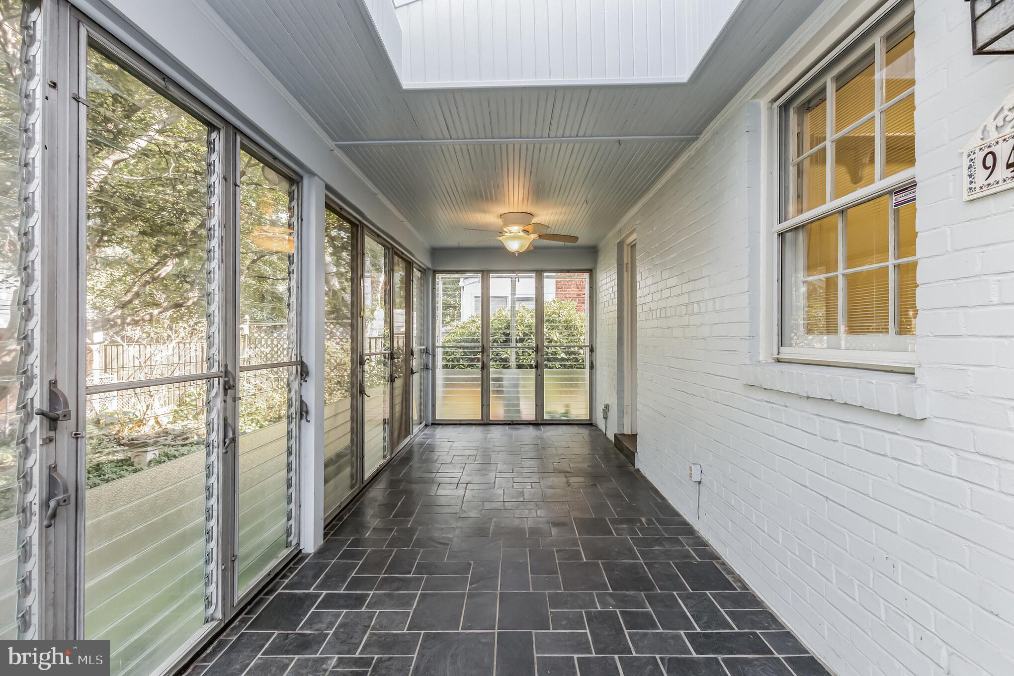 9410 Colesville Road Silver Spring, MD 20901 - Photo 3 of 38 Sun porch with skylight