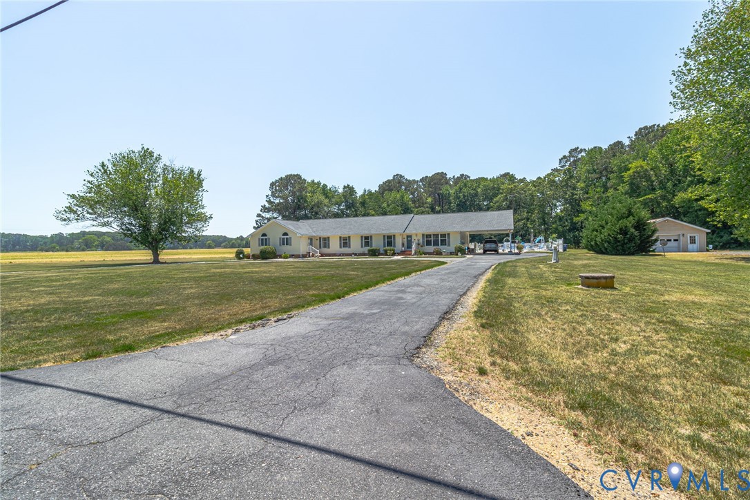 4400 Hacks Neck Road Heathsville, VA 22473 - Photo 71 of 78 a view of a lake with a yard