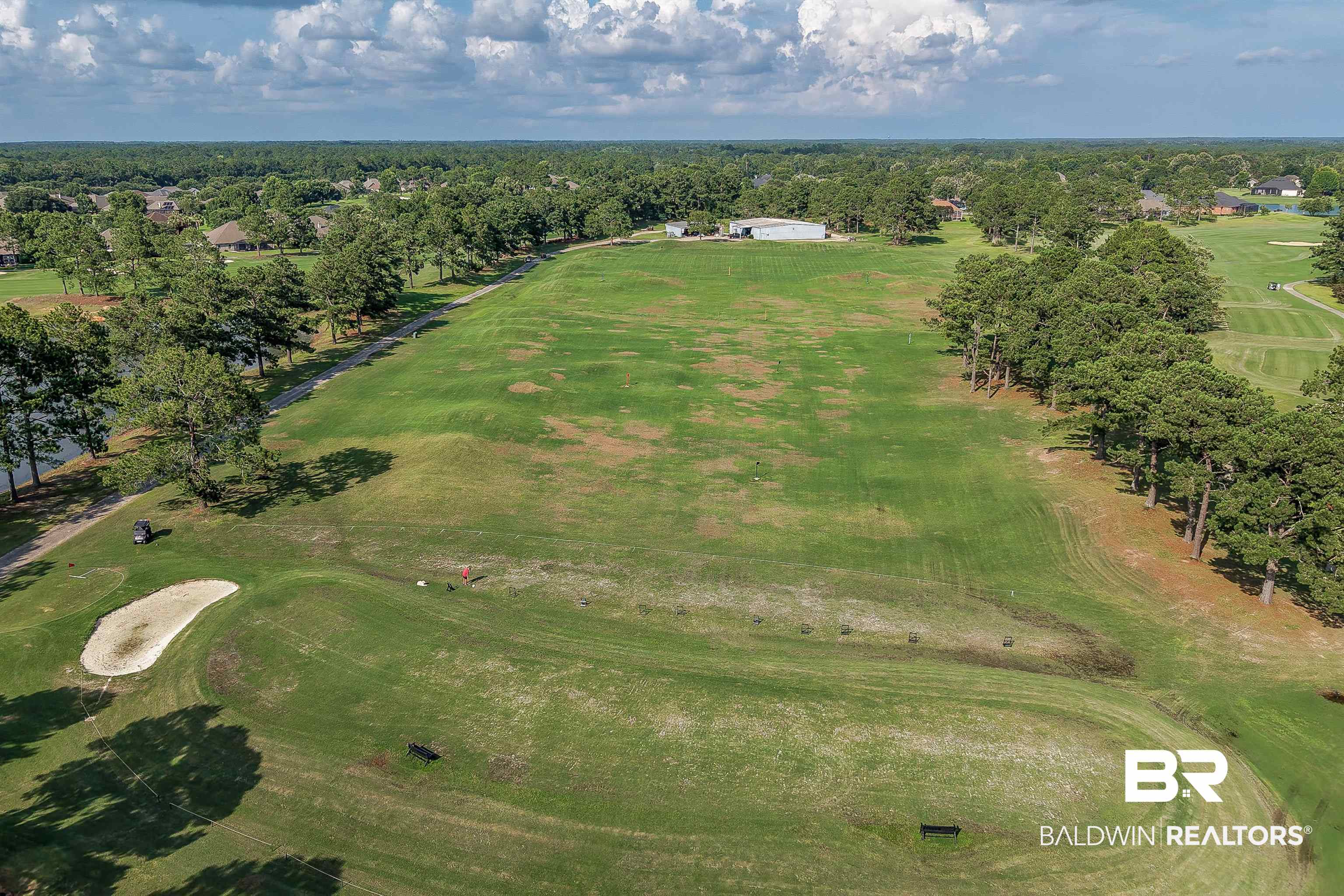 22685 County Road 12 Foley, AL 36535 - Photo 88 of 89 Expansive golf course featuring a sand trap, green fairways, and mature pine trees