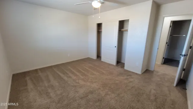 an empty room with a bathroom