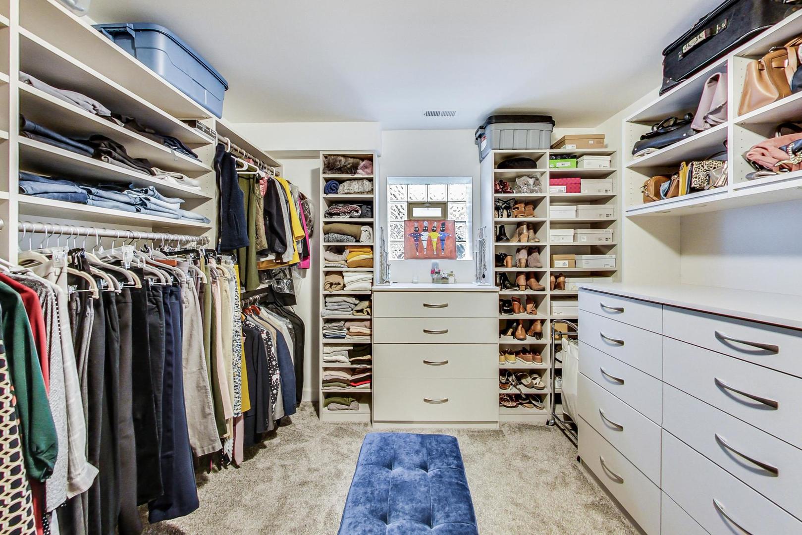 1532 West Fry Street, Unit 1 Chicago, IL 60642 - Photo 24 of 34 a view of walk in closet with clothes and shoes