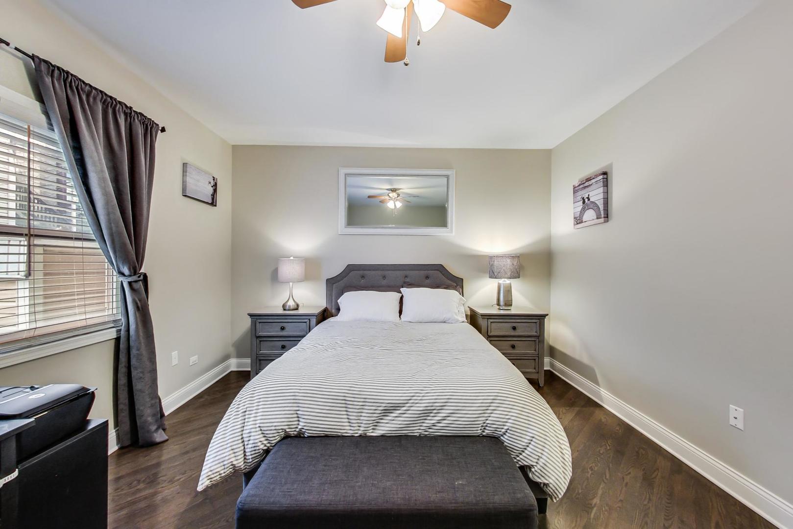 1532 West Fry Street, Unit 1 Chicago, IL 60642 - Photo 32 of 34 a bedroom with a bed and window