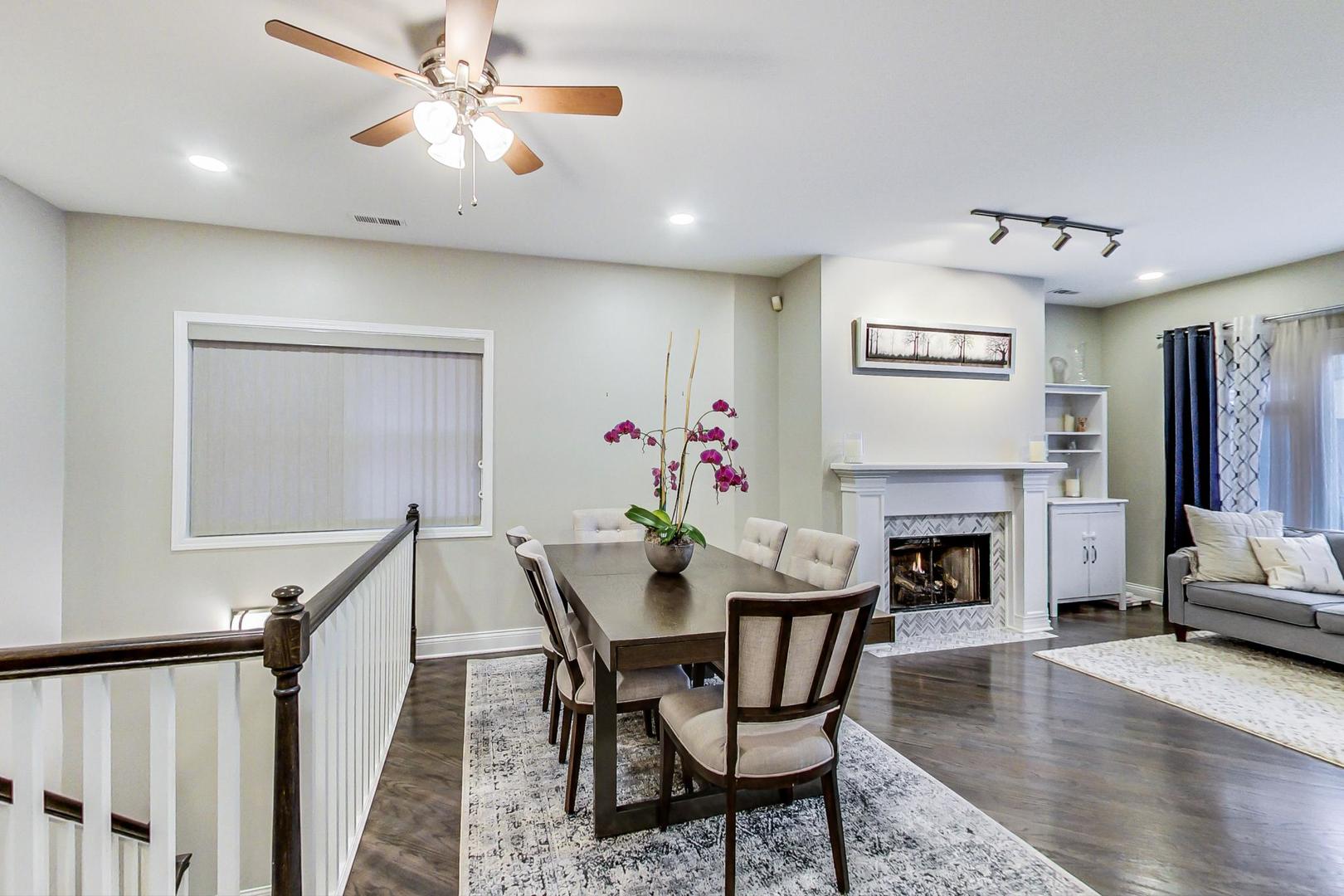 1532 West Fry Street, Unit 1 Chicago, IL 60642 - Photo 8 of 34 a view of a dining room with furniture wooden floor and a chandelier