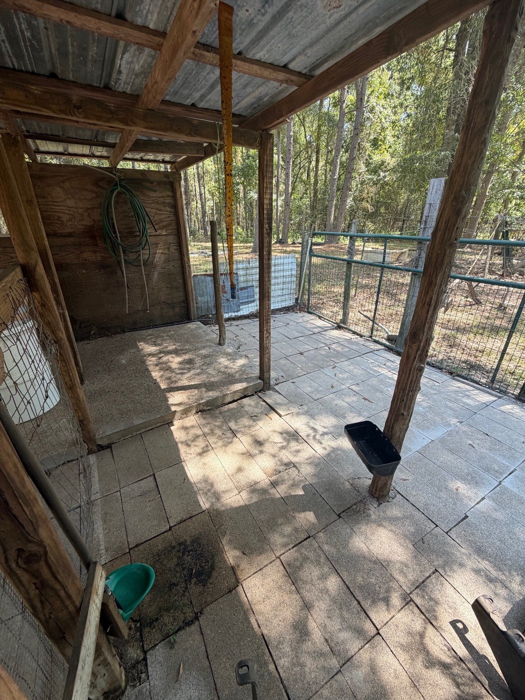 3080 Lee Turner Road Cleveland, TX 77328 - Photo 42 of 48 Well-positioned livestock shelter surrounded by mature trees offers shade, functionality, and a peaceful rural setting.