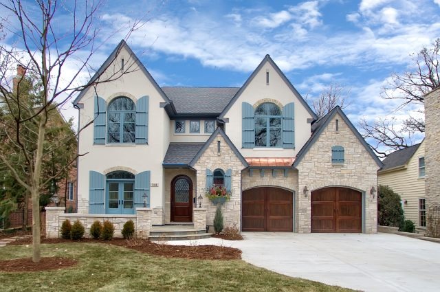 344 Forest Road Hinsdale, IL 60521 - Photo 1 of 25 a front view of a house with a yard