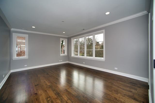 344 Forest Road Hinsdale, IL 60521 - Photo 15 of 25 a view of an empty room with wooden floor and a window