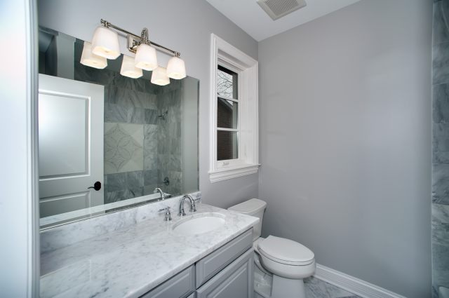 344 Forest Road Hinsdale, IL 60521 - Photo 20 of 25 a bathroom with a sink a toilet and shower