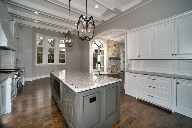 344 Forest Road Hinsdale, IL 60521 - Photo 8 of 25 a open kitchen with stainless steel appliances granite countertop a stove oven and a refrigerator with cabinets