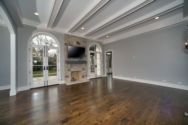 344 Forest Road Hinsdale, IL 60521 - Photo 10 of 25 wooden floor in an empty room with a fireplace