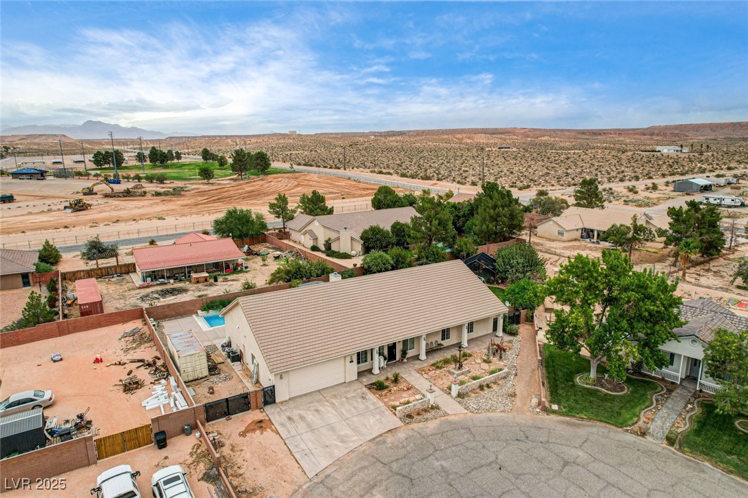 1140 Mahoney Avenue Logandale, NV 89021 - Photo 46 of 51 View of rural area with a mountain backdrop and a desert landscape
