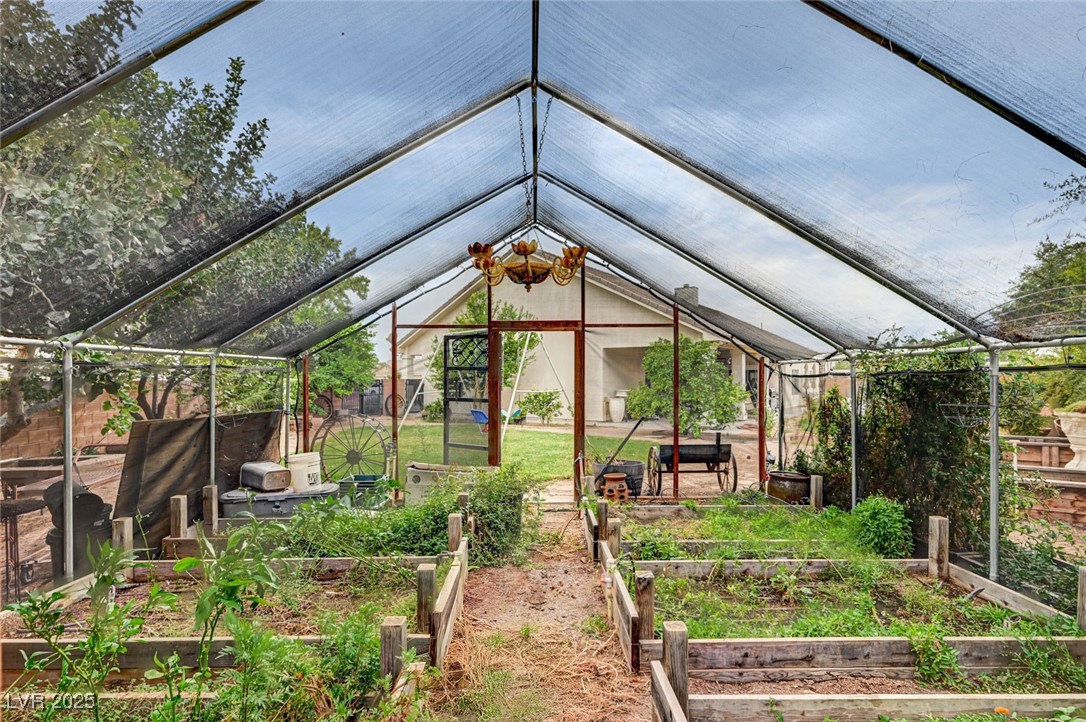 1140 Mahoney Avenue Logandale, NV 89021 - Photo 6 of 51 Unfurnished sunroom featuring lofted ceiling