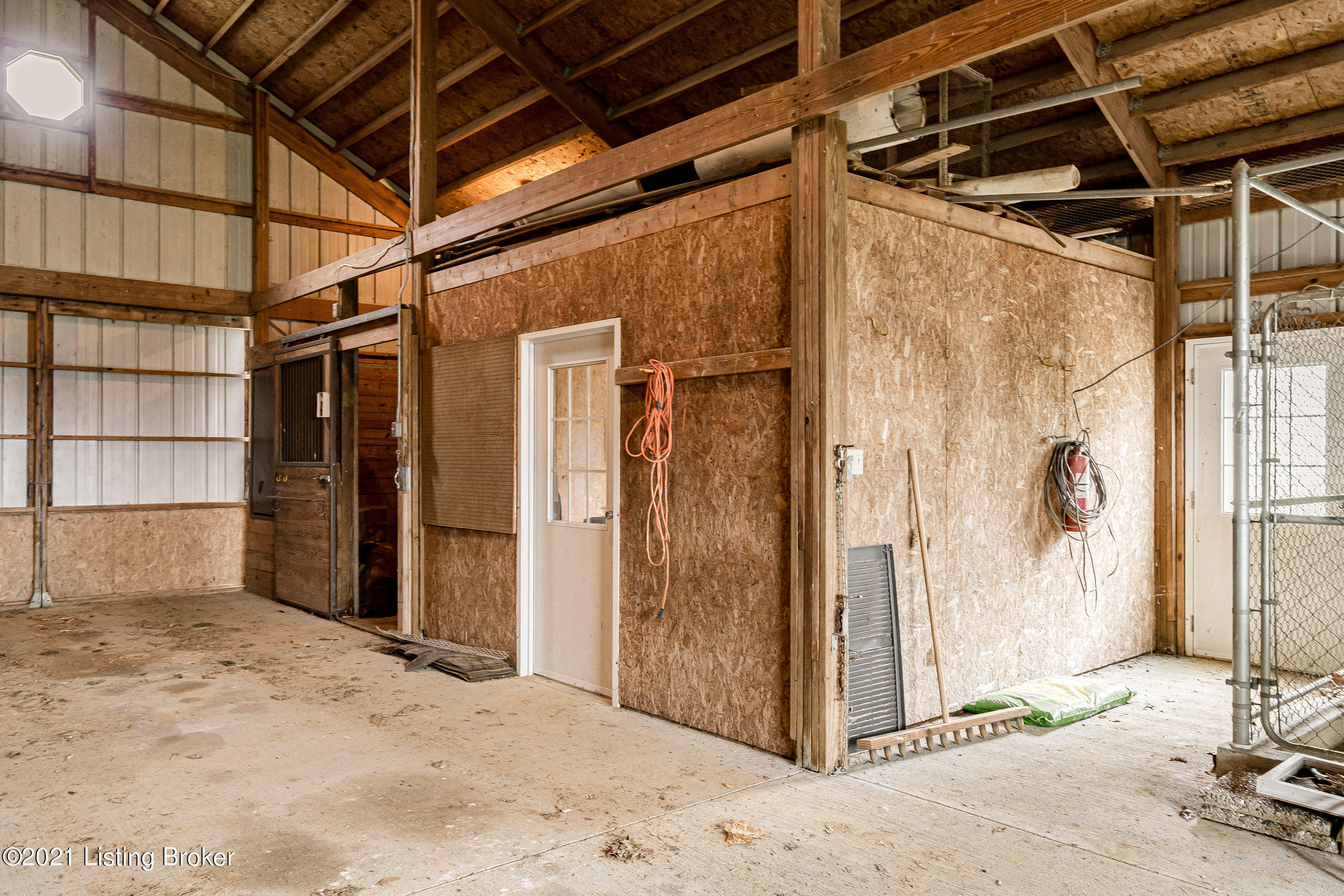 15301 Deer Run Road Louisville, KY 40299 - Photo 79 of 95 Large tack/feed storage room with office space