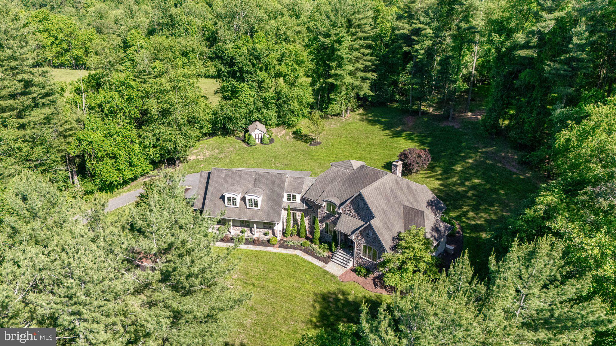 3814 Rocks Station Road Street, MD 21154 - Photo 68 of 73 Serene estate nestled in lush greenery.