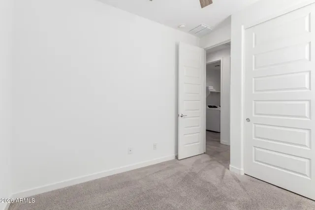 an empty room with closet