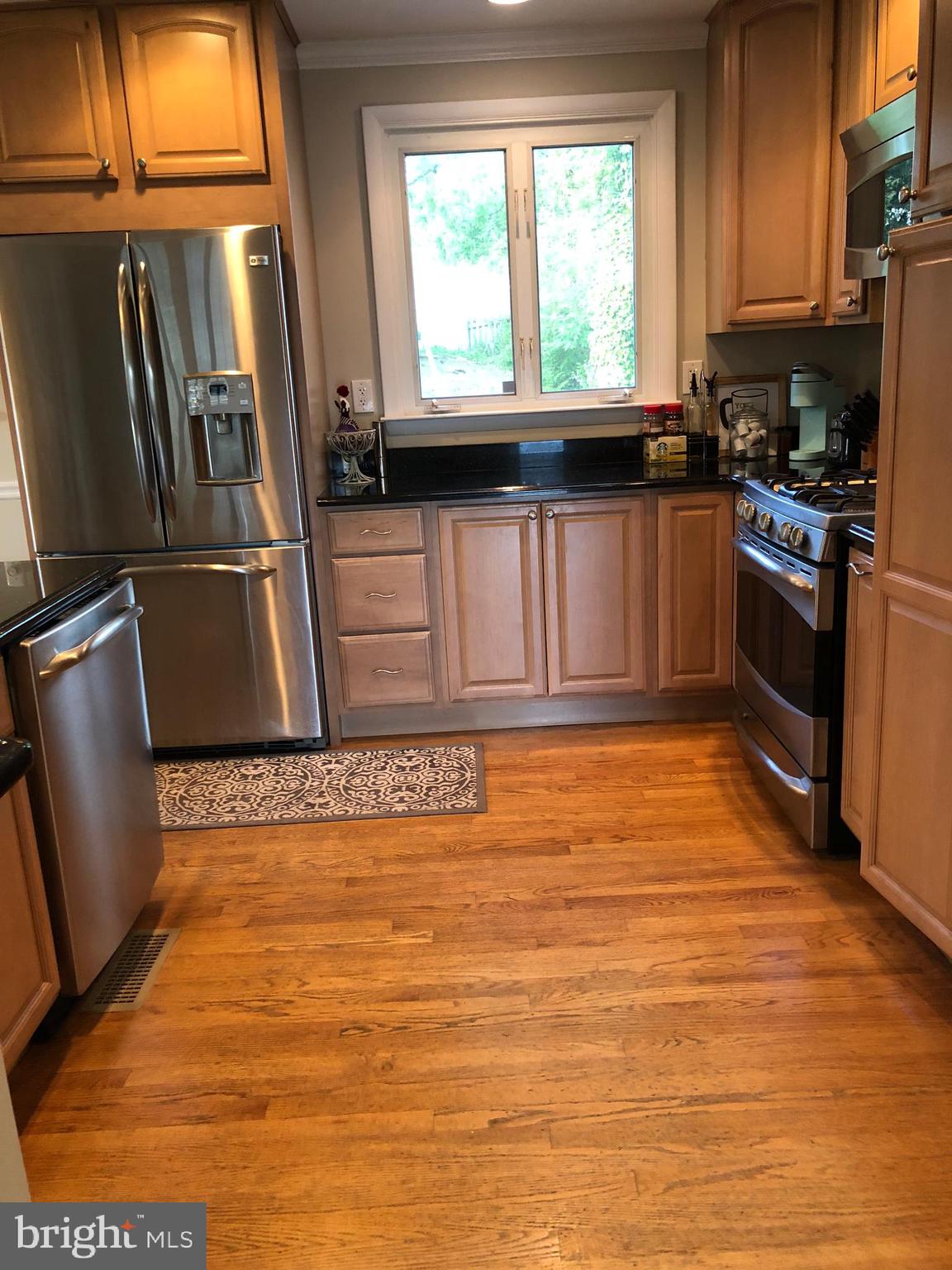 8211 Alston Road Baltimore, MD 21204 - Photo 7 of 41 Kitchen -Granite Counters and Stainless Steel