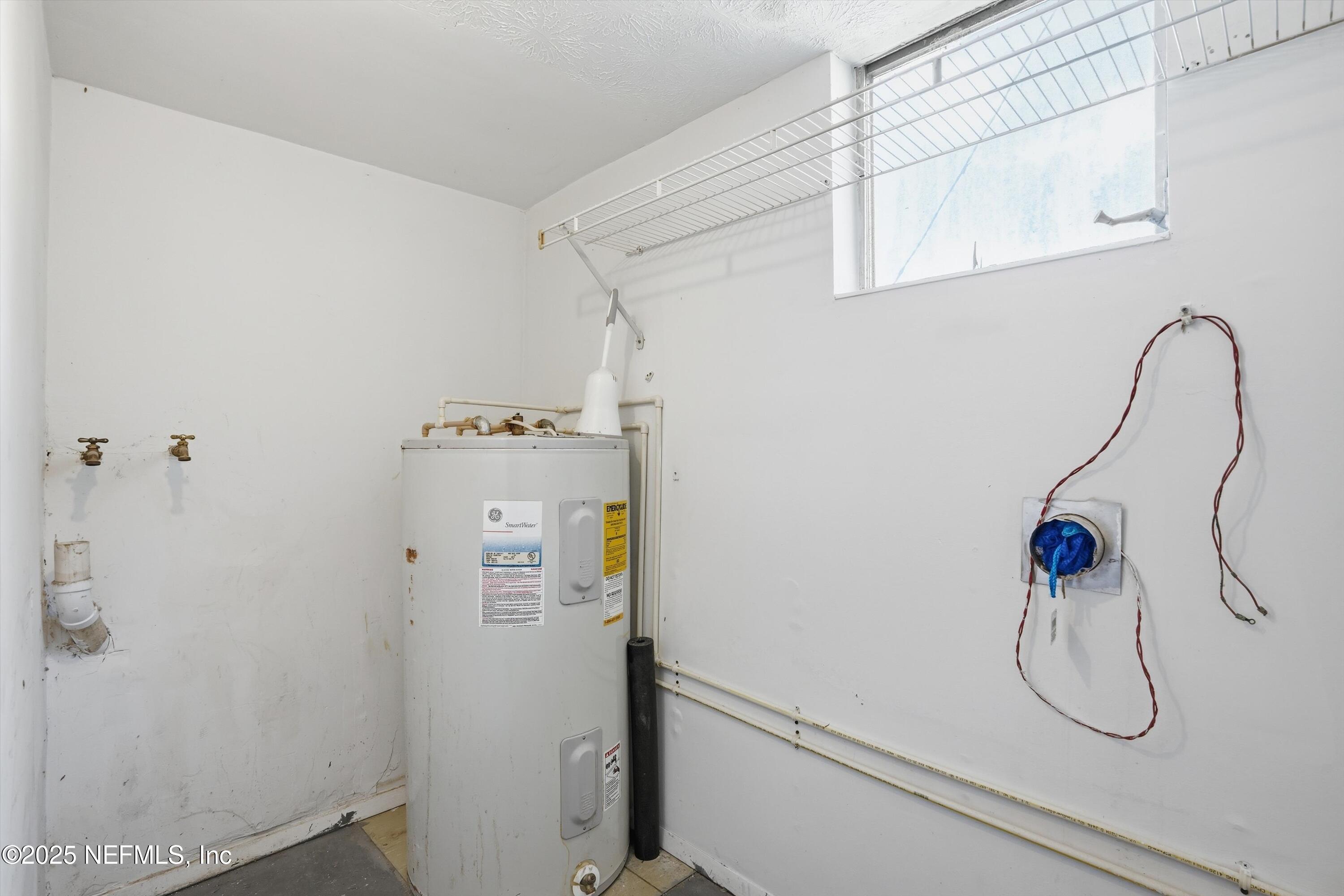 11558 Raft Road Jacksonville, FL 32218 - Photo 14 of 32 a bathroom with a shower