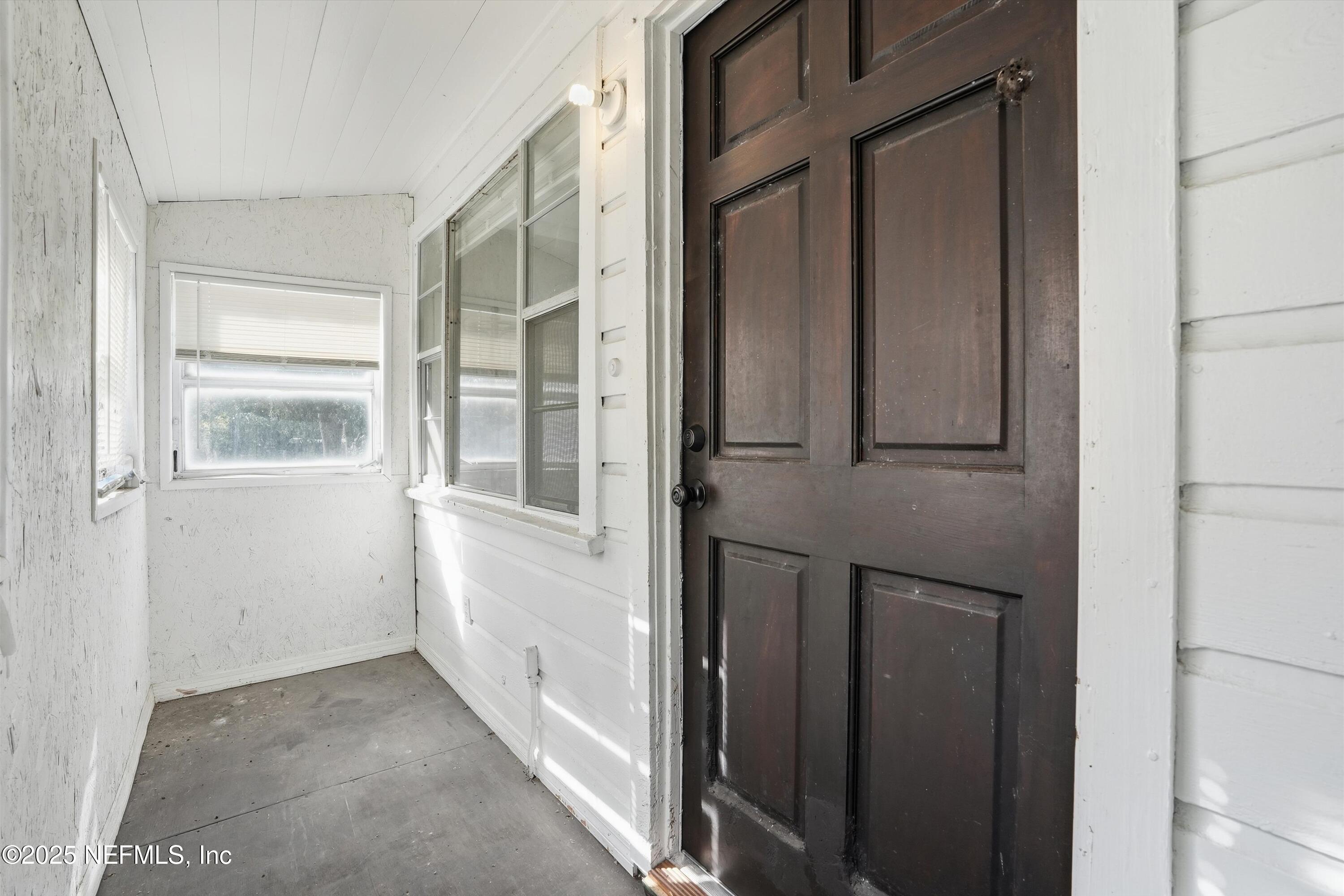 11558 Raft Road Jacksonville, FL 32218 - Photo 15 of 32 a view of a house with an entryway