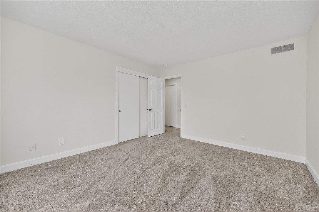 811 Wind Bluff Point Springboro, OH 45066 - Photo 27 of 51 This spacious bedroom offers ample natural light and a neutral palette, awaiting your personal touch.