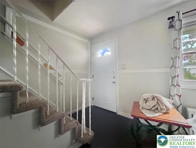 a view of a livingroom with furniture