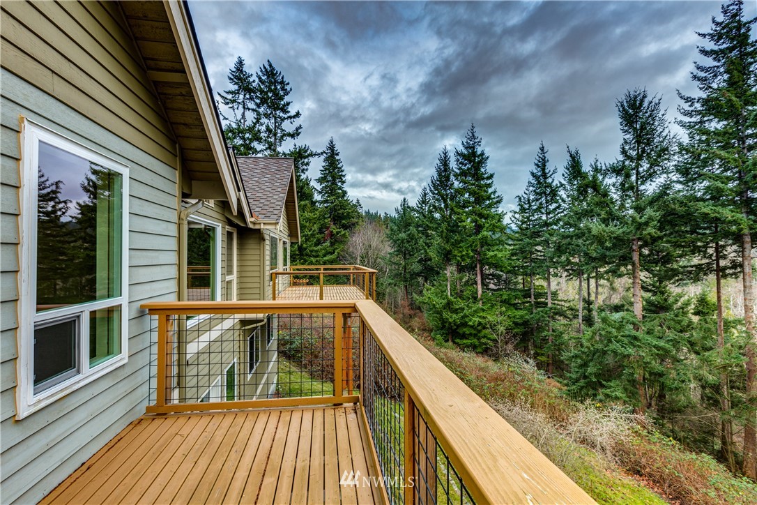 208 Sea Pines Road Bellingham, WA 98229 - Photo 11 of 34 a view of balcony with wooden floor and fence