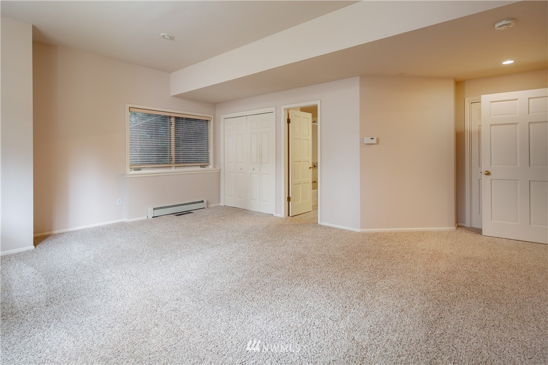208 Sea Pines Road Bellingham, WA 98229 - Photo 32 of 34 a view of an empty room with a window