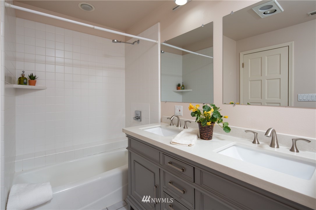 208 Sea Pines Road Bellingham, WA 98229 - Photo 33 of 34 a bathroom with a granite countertop sink and a mirror