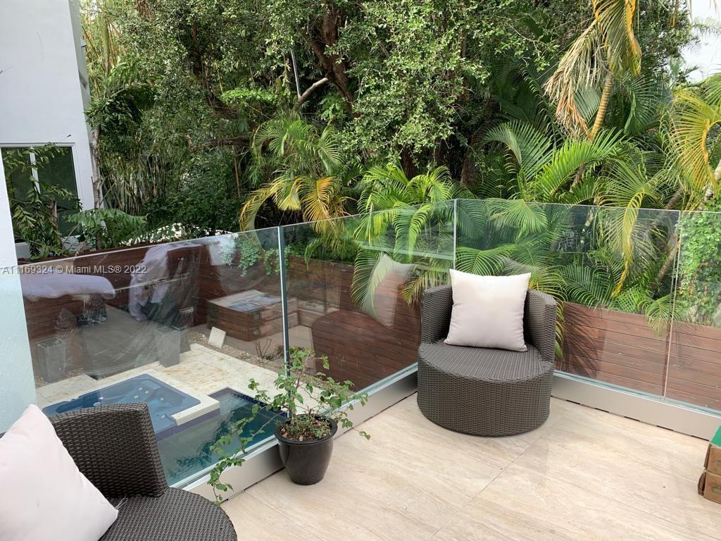 a view of a couches in a patio