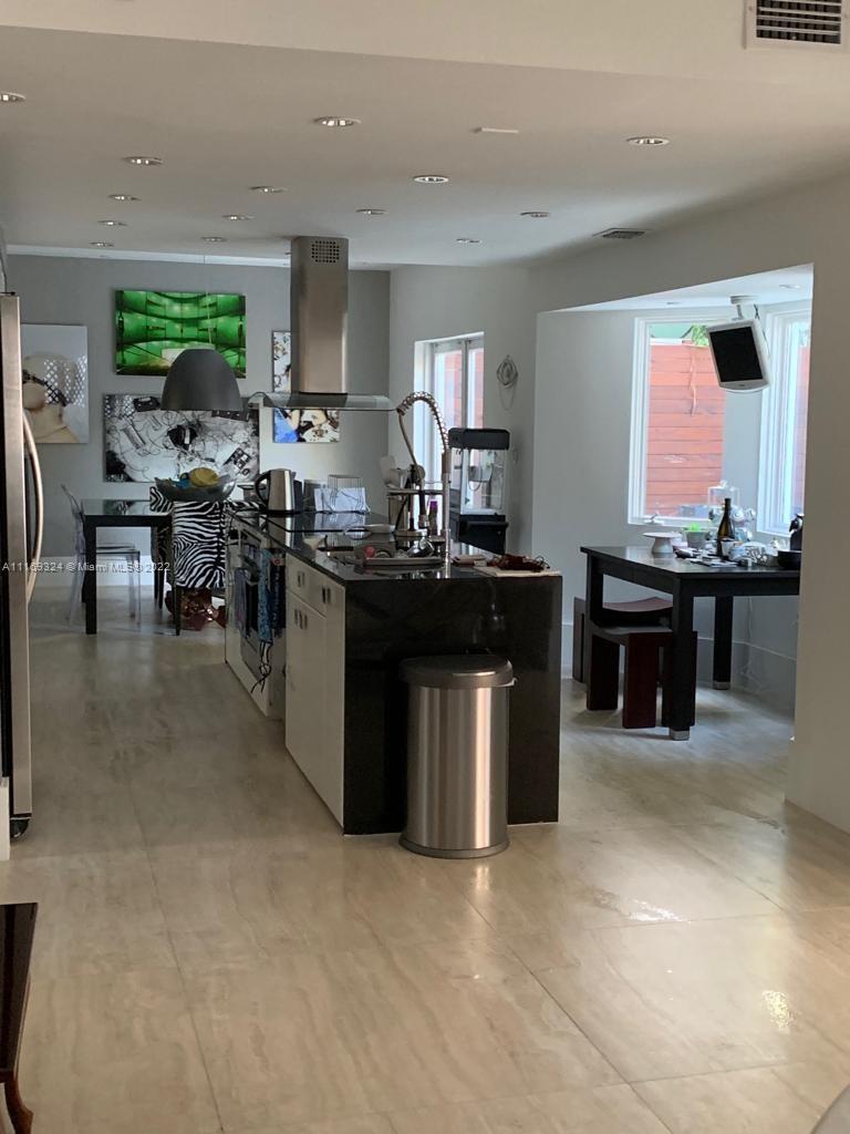 1830 Chucunantah Road Miami, FL 33133 - Photo 2 of 8 a kitchen with lots of counter top space