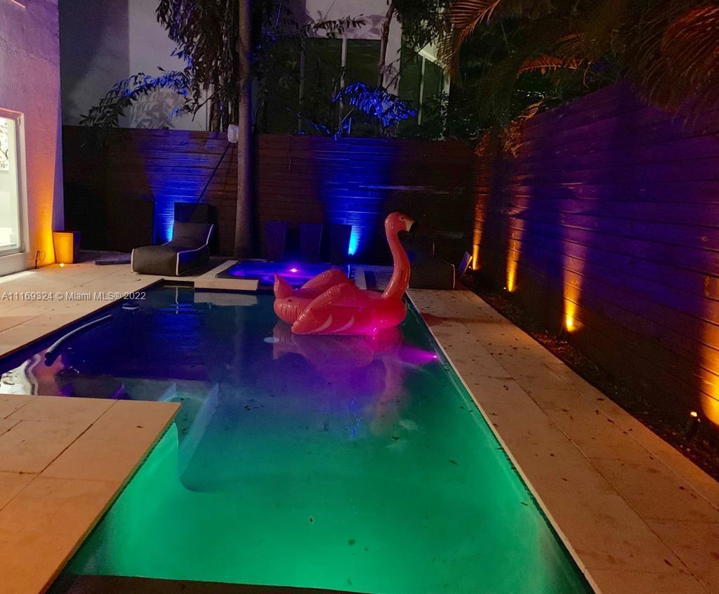 1830 Chucunantah Road Miami, FL 33133 - Photo 6 of 8 a view of a backyard