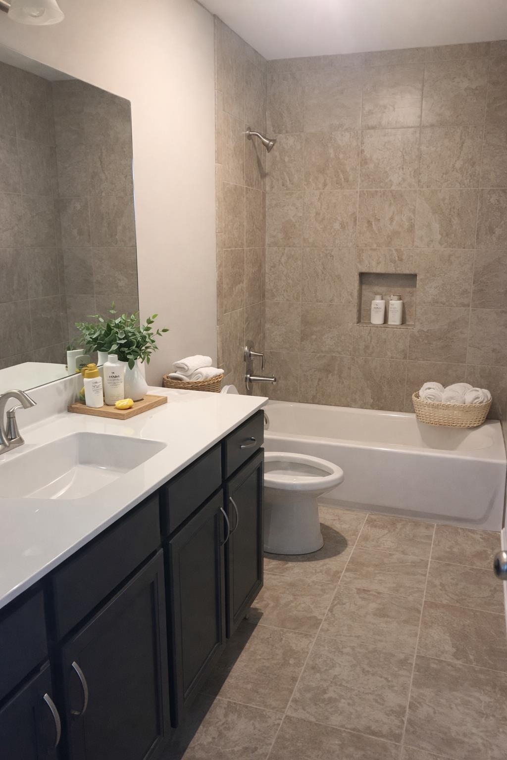 8443 Butterfly View Lane Bartlett, TN 38133 - Photo 5 of 12 a bathroom with a sink a toilet and bathtub