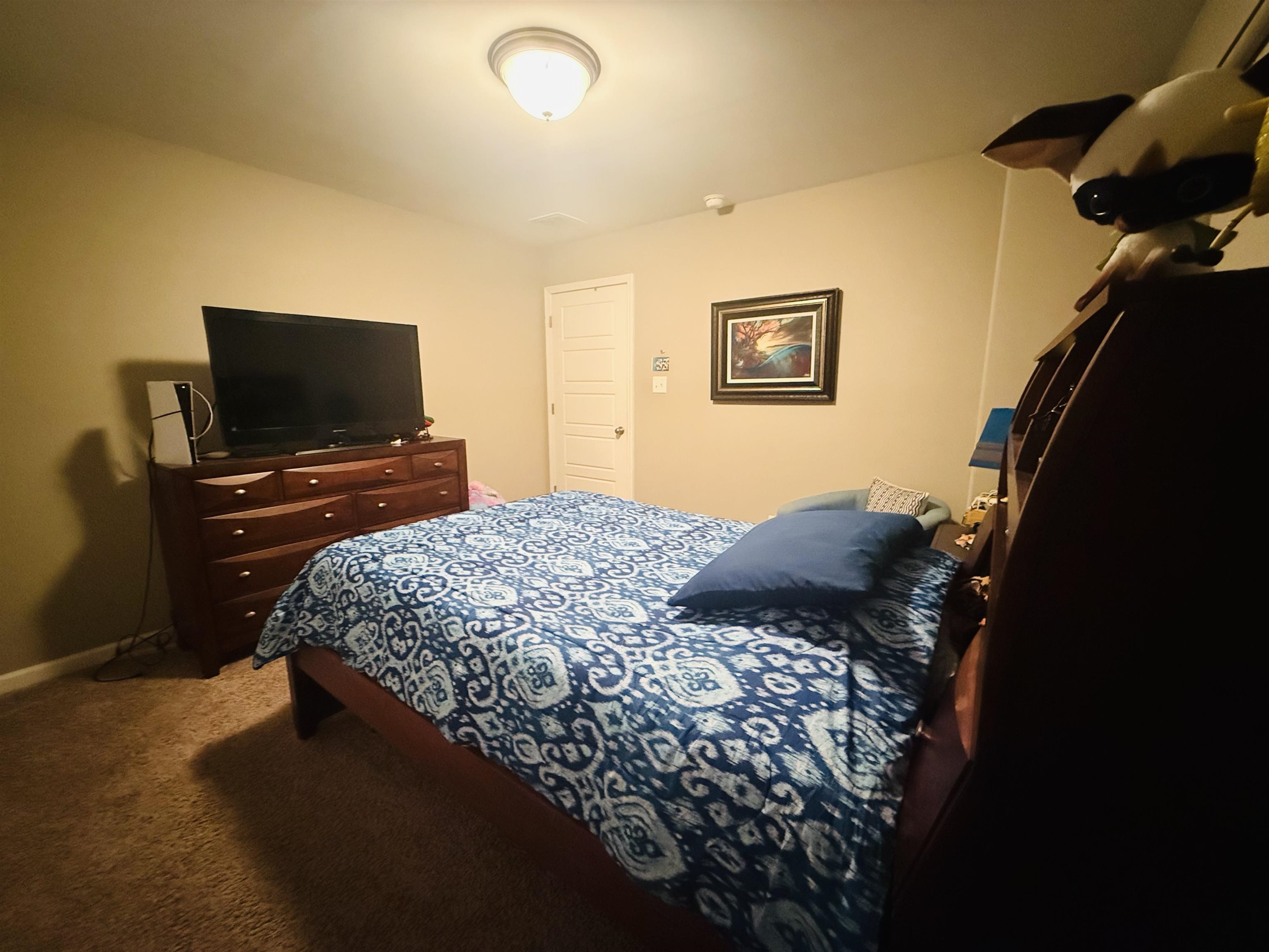 8443 Butterfly View Lane Bartlett, TN 38133 - Photo 10 of 12 Carpeted bedroom with baseboards