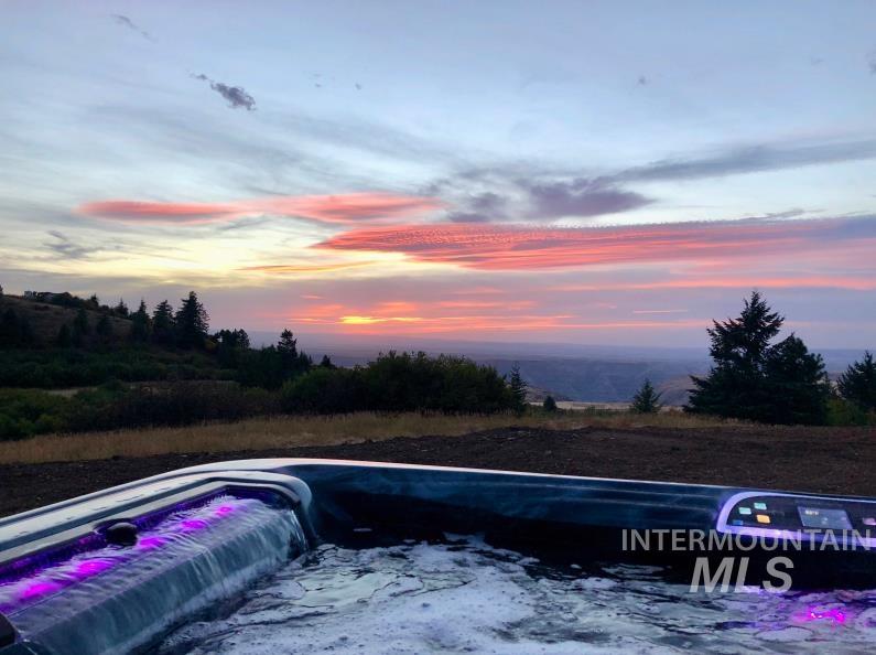 19378 Homestead Loop Lewiston, ID 83501 - Photo 4 of 42 View of swimming pool with a hot tub