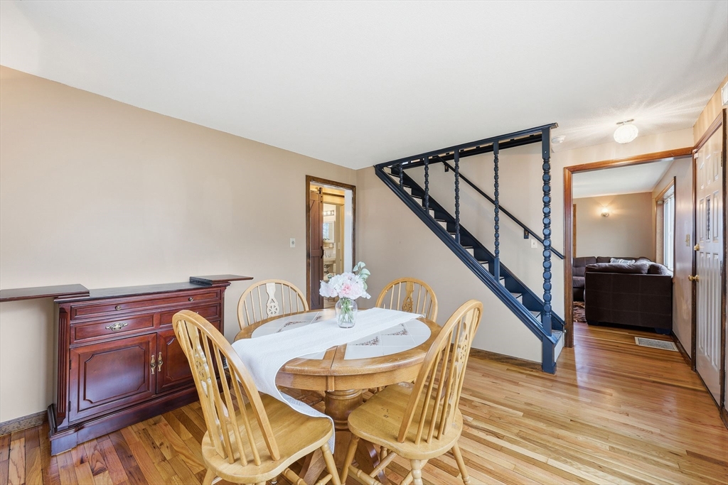 104 Chateaugay Street Chicopee, MA 01020 - Photo 13 of 38 a dining room with furniture and wooden floor