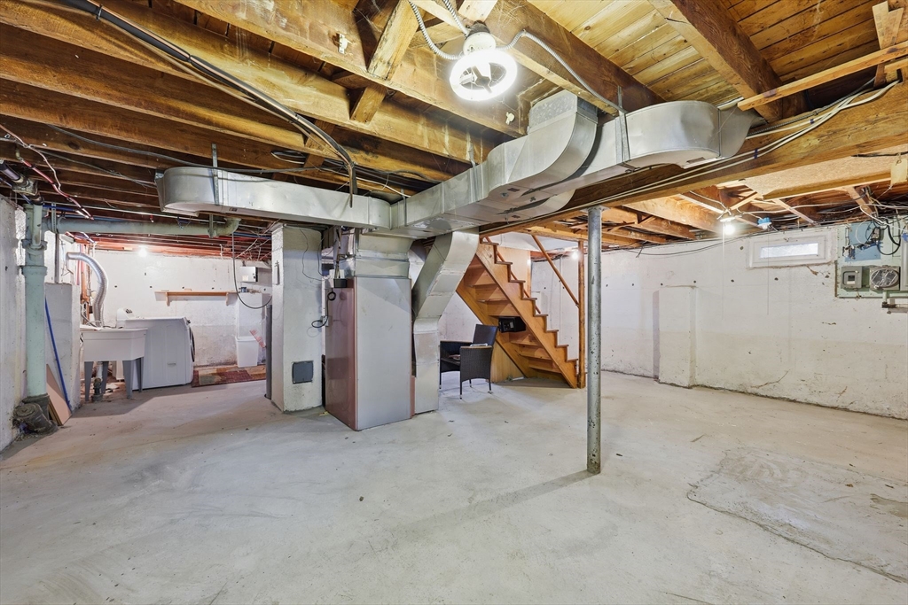 104 Chateaugay Street Chicopee, MA 01020 - Photo 32 of 38 a view of empty room with wooden ceiling