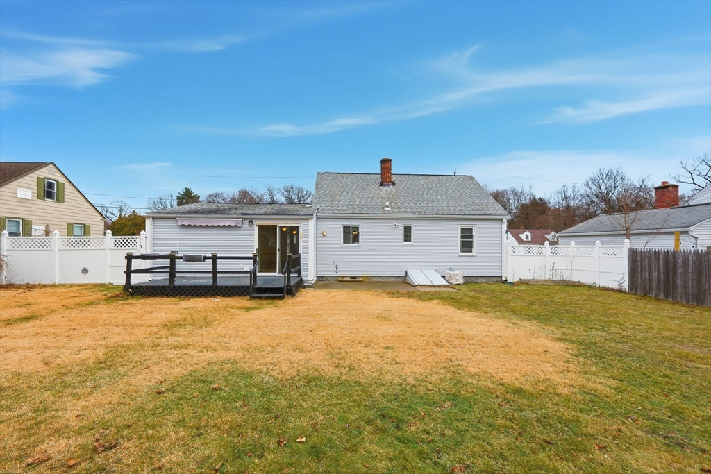104 Chateaugay Street Chicopee, MA 01020 - Photo 33 of 38 a view of a house with a yard