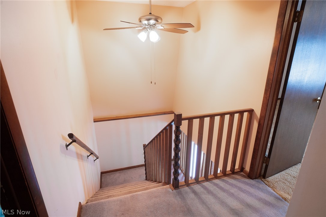 11 Pacific Road Northeast Carrollton, OH 44615 - Photo 26 of 46 The landing at the top of the steps with large hall closet just out of sight