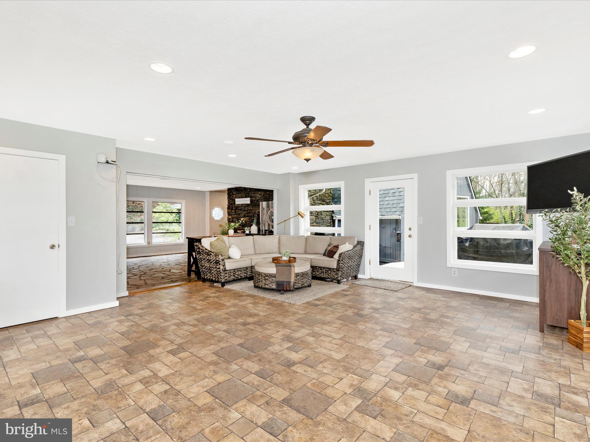 111 Bachmans Valley Road Westminster, MD 21158 - Photo 14 of 97 a living room with furniture and a large window